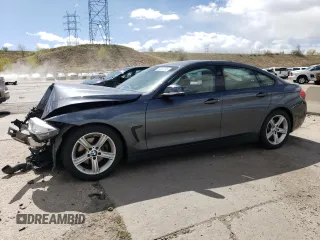 2015 BMW 4 Series 428i z VIN WBA4A5C53FG051038, wystawiony jako Copart lot #54909705 z przebiegiem 101 536 mil mil oraz Nie do naprawy • Non repairable. Historia ofert i sprzedaży dostępna na DreamBid. Obrazek 1.