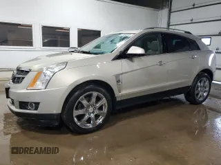 2012 Cadillac SRX Luxury Collection z VIN 3GYFNAE35CS502983, wystawiony jako Copart lot #57980695 z przebiegiem 117 761 mil mil oraz Szkoda całkowita • Salvage title. Historia ofert i sprzedaży dostępna na DreamBid. Obrazek 1.