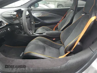 2023 McLaren Artura z VIN SBM16AEA4PW001953, wystawiony jako Copart lot #88790405 z przebiegiem 6864 mil mil oraz Nie do naprawy. Historia ofert i sprzedaży dostępna na DreamBid. Obrazek 7.