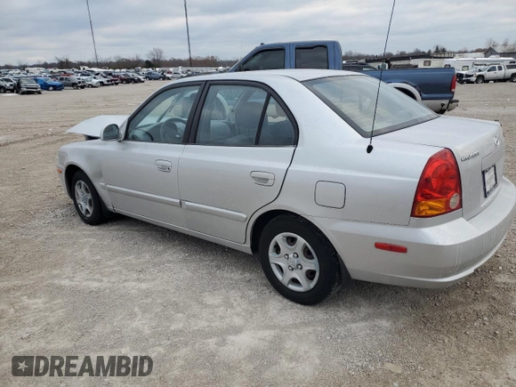 2004 Hyundai Accent GL with VIN KMHCG45C94U564176, listed as a Copart auction lot 82963944 with 454,400 mi miles and Salvage Title. Bid and sale history available at carsss.com. Image 2.