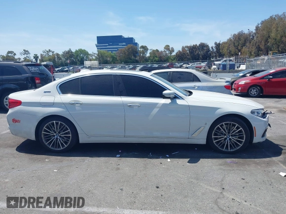 2018 BMW 5 Series 530e with VIN WBAJA9C58JB252868, listed as a IAAI auction lot 42323949 with 100,530 mi miles and . Bid and sale history available at DreamBid. Image 13.