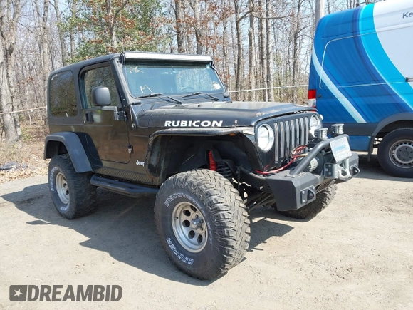 2004 Jeep Wrangler Rubicon with VIN 1J4FA69S64P789308, listed as a IAAI auction lot 41714489 with 186,302 mi miles. Bid and sale history available at carsss.com. Image 1.