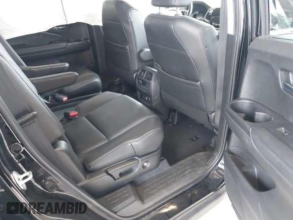 2021 Honda Pilot Elite with VIN 5FNYF6H04MB043014, listed as a IAAI auction lot 41826931 with 63,546 mi miles and . Bid and sale history available at DreamBid. Image 8.