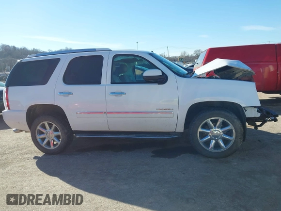 2014 GMC Yukon Denali with VIN 1GKS2EEF2ER111301, listed as a IAAI auction lot 41636112 with 185,956 mi miles. Bid and sale history available at carsss.com. Image 13.
