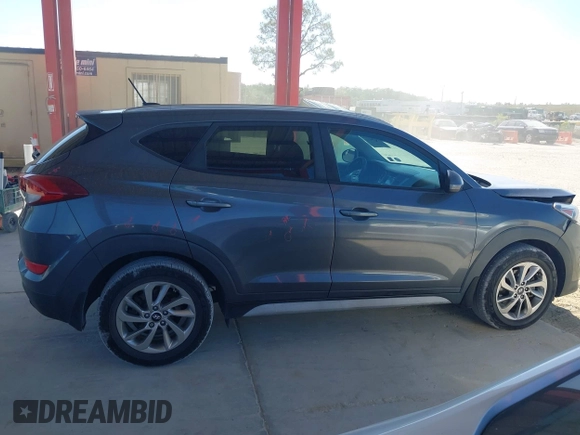 2017 Hyundai Tucson SE with VIN KM8J33A4XHU438510, listed as a IAAI auction lot 42021812 with 117,848 mi miles. Bid and sale history available at carsss.com. Image 13.