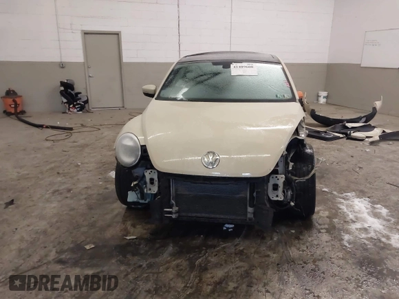 2019 Volkswagen Beetle S with VIN 3VWFD7ATXKM705322, listed as a IAAI auction lot 41409600 with 97,479 mi miles. Bid and sale history available at carsss.com. Image 13.