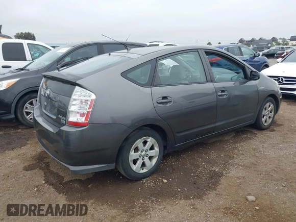 2007 Toyota Prius with VIN JTDKB20U373224079, listed as a IAAI auction lot 42449277 with 332,049 mi miles and . Bid and sale history available at DreamBid. Image 4.