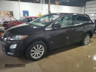 2012 Mazda CX-7 i Sport z VIN JM3ER2B59C0419069, wystawiony jako Copart lot #47682805 z przebiegiem 166 189 mil mil oraz Tytuł czysty. Historia ofert i sprzedaży dostępna na DreamBid. Obrazek 1.