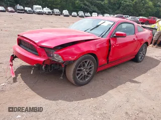 2014 Ford Mustang V6 with VIN 1ZVBP8AMXE5297869, listed as a IAAI auction lot 42452664 with 164,356 mi miles and . Bid and sale history available at DreamBid. Image 18.