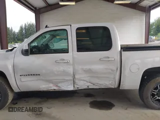 2011 Chevrolet Silverado 1500 LT with VIN 3GCPKSE34BG333288, listed as a IAAI auction lot 42130526 with 161,278 mi miles and . Bid and sale history available at DreamBid. Image 6.