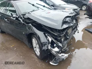 2015 Infiniti Q50 Premium with VIN JN1BV7AR1FM405854, listed as a IAAI auction lot 41516401 with 89,382 mi miles and . Bid and sale history available at DreamBid. Image 19.