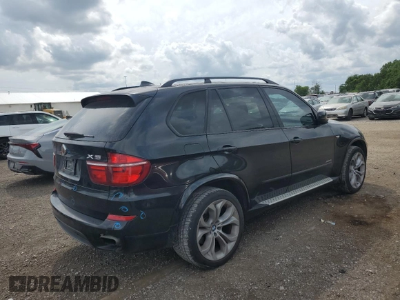 2012 BMW X5 50i with VIN 5UXZV8C51CL424965, listed as a Copart auction lot 64414455 with 121,894 mi miles and Clean title. Bid and sale history available at DreamBid. Image 3.
