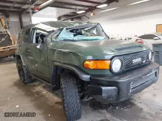 2011 Toyota FJ Cruiser with VIN JTEBU4BF4BK112311, listed as a IAAI auction lot 41469354 with 165,314 mi miles. Bid and sale history available at carsss.com. Image 1.