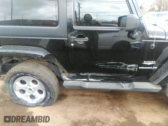 2014 Jeep Wrangler Sahara with VIN 1C4AJWBG9EL161712, listed as a IAAI auction lot 41839193 with 68,318 mi miles and . Bid and sale history available at DreamBid. Image 6.