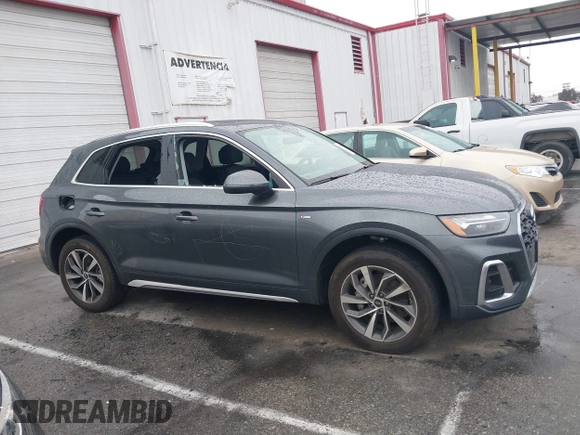 2023 Audi Q5 S line Premium Plus z VIN WA1EAAFY7P2178566, wystawiony jako IAAI lot #41734994 z przebiegiem Nie podano mil oraz . Historia ofert i sprzedaży dostępna na DreamBid. Obrazek 13.