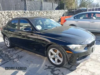 2015 BMW 3 Series 328i with VIN WBA3C1C53FK120984, listed as a IAAI auction lot 41338035 with 119,486 mi miles and . Bid and sale history available at carsss.com. Image 1.