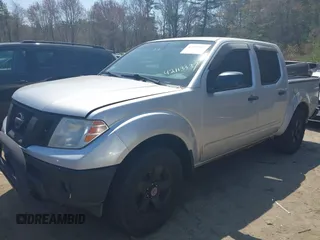 2011 Nissan Frontier Pro-4X with VIN 1N6AD0EVXBC407089, listed as a IAAI auction lot 42113537 with 124,853 mi miles and . Bid and sale history available at DreamBid. Image 2.