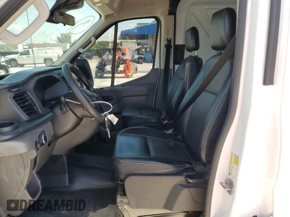 2021 Ford Transit Cargo with VIN 1FTBR3X83MKA58920, listed as a Copart auction lot 59946095 with 65,655 mi miles and Salvage title. Bid and sale history available at DreamBid. Image 7.