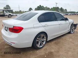 2018 BMW 3 Series 330i with VIN WBA8B9C59JEE82660, listed as a IAAI auction lot 41899267 with 65,205 mi miles and . Bid and sale history available at DreamBid. Image 4.