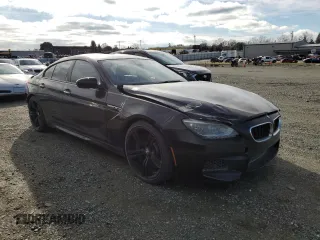 2017 BMW M6 z VIN WBS6E9C52HG437288, wystawiony jako Copart lot #38576804 z przebiegiem 25 137 mil mil oraz Tytuł czysty. Historia ofert i sprzedaży dostępna na DreamBid. Obrazek 4.