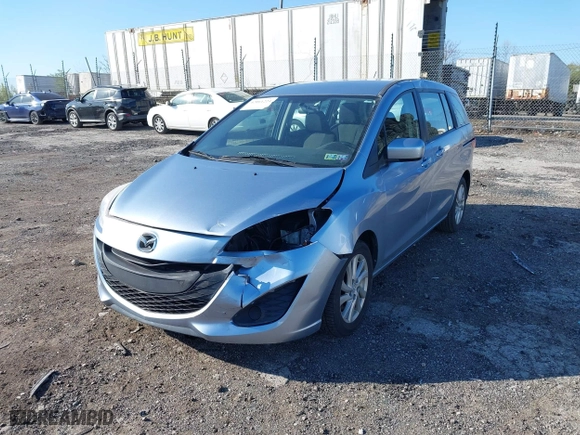 2012 Mazda Mazda5 Sport with VIN JM1CW2BL7C0105928, listed as a IAAI auction lot 42061224 with 59,993 mi miles. Bid and sale history available at carsss.com. Image 6.