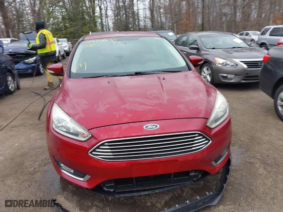 2015 Ford Focus Titanium with VIN 1FADP3N23FL248880, listed as a IAAI auction lot 41474936 with 86,245 mi miles. Bid and sale history available at carsss.com. Image 12.