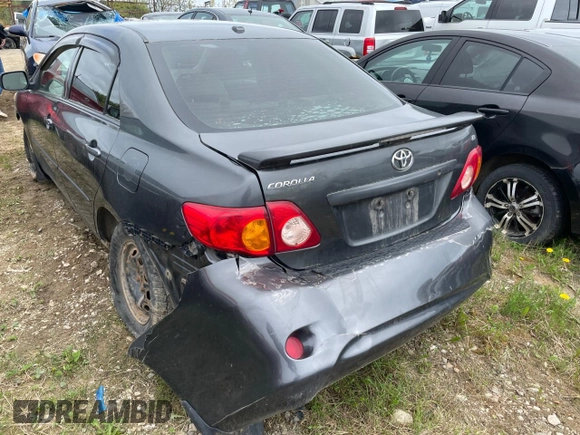 2009 Toyota Corolla with VIN 2T1BU40E49C067431, listed as a Copart auction lot 70030084 with 301,997 mi miles and Salvage Title. Bid and sale history available at carsss.com. Image 2.