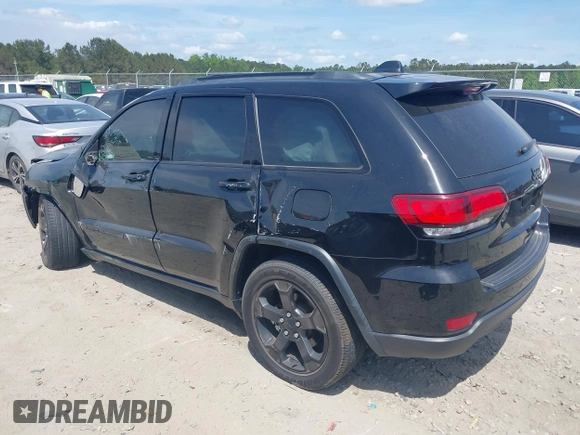 2021 Jeep Grand Cherokee Laredo E z VIN 1C4RJEAG9MC740244, wystawiony jako IAAI lot #42112847 z przebiegiem 32 897 mil mil oraz . Historia ofert i sprzedaży dostępna na DreamBid. Obrazek 14.