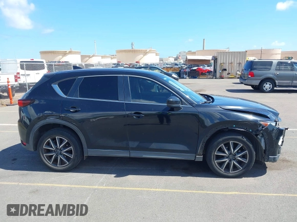 2018 Mazda CX-5 Touring z VIN JM3KFACM5J0309533, wystawiony jako IAAI lot #42195429 z przebiegiem 91 928 mil mil oraz . Historia ofert i sprzedaży dostępna na DreamBid. Obrazek 13.