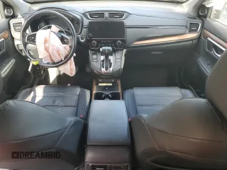 2020 Honda CR-V Touring with VIN 2HKRW2H96LH677520, listed as a Copart auction lot 52264155 with 33,909 mi miles and Salvage Title. Bid and sale history available at DreamBid. Image 8.