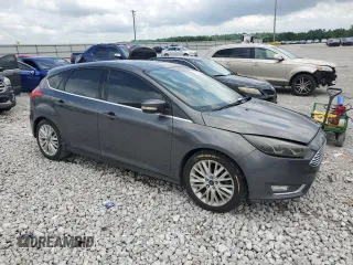 2017 Ford Focus Titanium z VIN 1FADP3N22HL307260, wystawiony jako Copart lot #61399785 z przebiegiem 103 293 mil mil oraz Szkoda całkowita • Salvage title. Historia ofert i sprzedaży dostępna na DreamBid. Obrazek 4.
