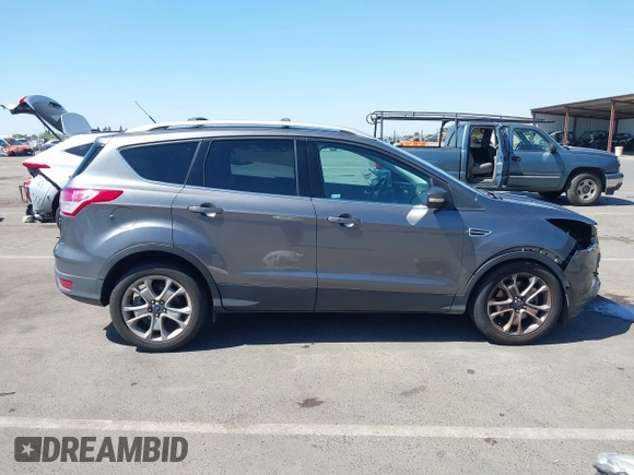 2014 Ford Escape Titanium с VIN 1FMCU0J95EUC22897, выставлен на аукционе IAAI как лот 42204135 с пробегом 144 534 миль миль и . История ставок и продаж доступна на DreamBid. Изображение 14.