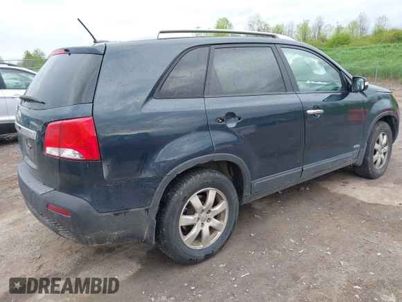 2013 Kia Sorento LX with VIN 5XYKTCA67DG405003, listed as a IAAI auction lot 42253887 with 197,093 mi miles and . Bid and sale history available at DreamBid. Image 4.