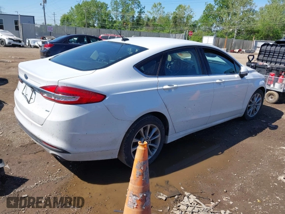2017 Ford Fusion SE z VIN 3FA6P0H7XHR415299, wystawiony jako IAAI lot #42232634 z przebiegiem 107 962 mil mil oraz . Historia ofert i sprzedaży dostępna na DreamBid. Obrazek 4.