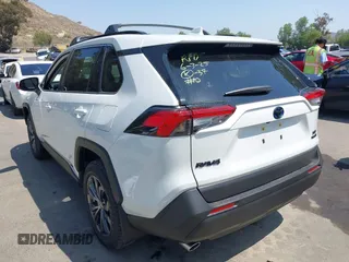 2024 Toyota RAV4 Hybrid XLE Premium with VIN JTMB6RFV9RJ063328, listed as a IAAI auction lot 42433233 with 9,874 mi miles and . Bid and sale history available at DreamBid. Image 3.