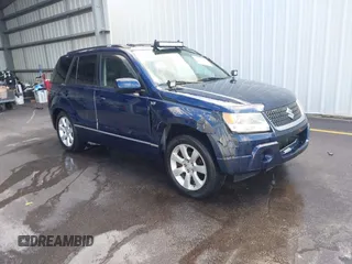 2010 Suzuki Grand Vitara Limited z VIN JS3TE1D9XA4100034, wystawiony jako IAAI lot #42466762 z przebiegiem 189 428 mil mil oraz . Historia ofert i sprzedaży dostępna na DreamBid. Obrazek 1.