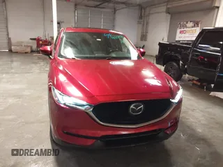 2020 Mazda CX-5 Grand Touring with VIN JM3KFBDM1L1809951, listed as a IAAI auction lot 41345854 with 117,376 mi miles. Bid and sale history available at carsss.com. Image 13.