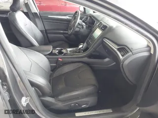 2016 Ford Fusion Energi Titanium with VIN 3FA6P0SU9GR103245, listed as a IAAI auction lot 41888435 with 123,975 mi miles. Bid and sale history available at carsss.com. Image 5.