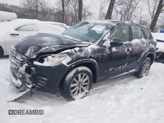 2016 Mazda CX-5 Sport z VIN JM3KE4BY0G0919017, wystawiony jako IAAI lot #41316161 z przebiegiem 209 259 mil mil oraz . Historia ofert i sprzedaży dostępna na DreamBid. Obrazek 2.