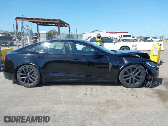 2022 Tesla Model S Plaid with VIN 5YJSA1E61NF483354, listed as a IAAI auction lot 41973636 with 32,541 mi miles and . Bid and sale history available at DreamBid. Image 13.
