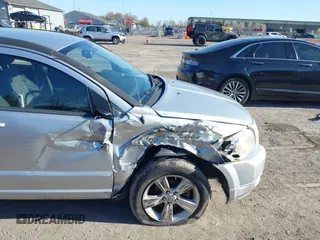 2012 Dodge Caliber SXT with VIN 1C3CDWDAXCD508338, listed as a IAAI auction lot 42091675 with 213,596 mi miles and . Bid and sale history available at carsss.com. Image 6.