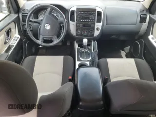2007 Mercury Mariner Luxury z VIN 4M2YU91117KJ02032, wystawiony jako Copart lot #50418815 z przebiegiem 128 498 mil mil oraz Szkoda całkowita • Salvage title. Historia ofert i sprzedaży dostępna na DreamBid. Obrazek 8.