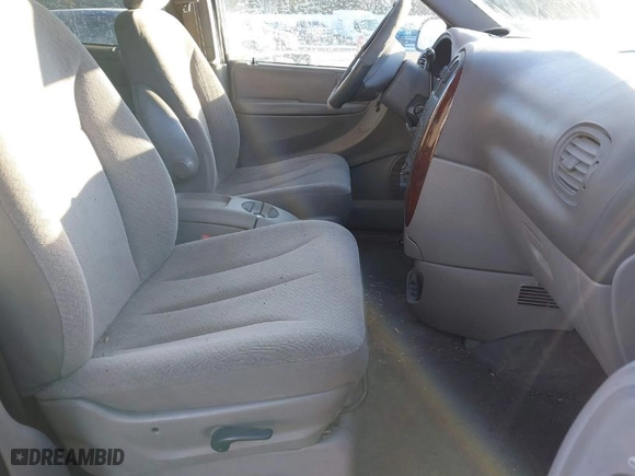 2003 Dodge Caravan Sport with VIN 2D4GP44L33R128512, listed as a IAAI auction lot 41422480 with 146,341 mi miles. Bid and sale history available at carsss.com. Image 5.