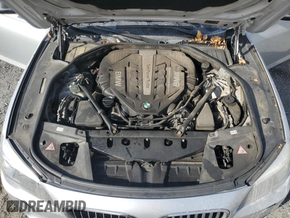 2013 BMW 7 Series 750i xDrive z VIN WBAYB6C53DD223796, wystawiony jako Copart lot #79402144 z przebiegiem 144 125 mil mil oraz Czysty tytuł • Clean title. Historia ofert i sprzedaży dostępna na DreamBid. Obrazek 11.