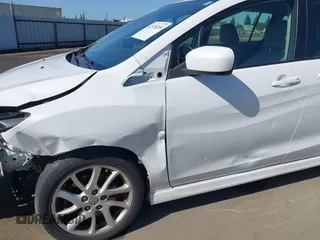 2012 Mazda 5 Touring with VIN JM1CW2CL7C0140452, listed as a IAAI auction lot 41970209 with 92,069 mi miles and . Bid and sale history available at DreamBid. Image 18.