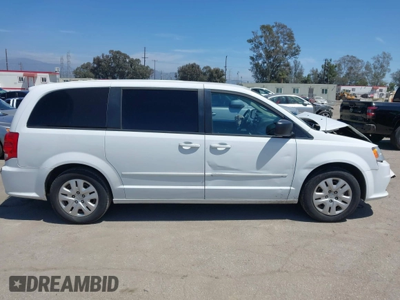 2016 Dodge Grand Caravan SE with VIN 2C4RDGBG2GR311654, listed as a IAAI auction lot 42056032 with 185,330 mi miles and . Bid and sale history available at DreamBid. Image 13.