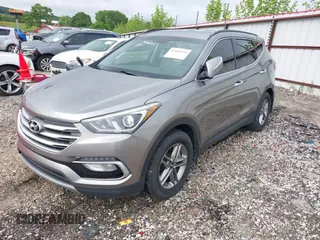2018 Hyundai Santa Fe 2.4L with VIN 5NMZU3LB1JH100507, listed as a IAAI auction lot 42182116 with 103,826 mi miles and . Bid and sale history available at DreamBid. Image 17.