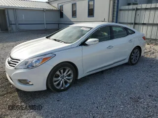2013 Hyundai Azera с VIN KMHFG4JG3DA217272, выставлен на аукционе Copart как лот 62233965 с пробегом 155 100 миль миль и Списание • Salvage title. История ставок и продаж доступна на DreamBid. Изображение 1.