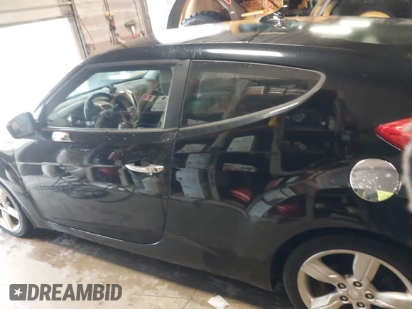 2012 Hyundai Veloster w/Gray Int с VIN KMHTC6AD3CU020230, выставлен на аукционе IAAI как лот 42307281 с пробегом 185 002 миль миль и . История ставок и продаж доступна на DreamBid. Изображение 15.