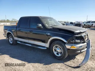 2003 Ford F-150 XLT with VIN 1FTRW07L73KA28876, listed as a Copart auction lot 49319565 with 290,880 mi miles and Salvage Title. Bid and sale history available at carsss.com. Image 4.